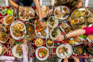 Family Sharing Traditional Lebanese Feast at Table